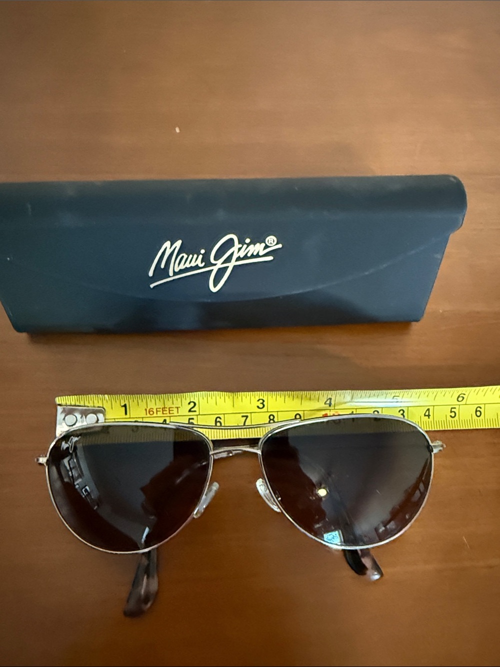 Maui Jim Aviator Sunglasses with Dark Brown Gradient Lenses and Silver Frame